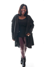 Curvy model in our burgundy pleather jeggings 