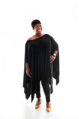 plus size model posing in our black angelica poncho