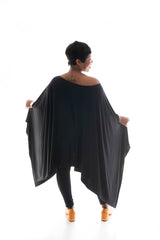 back view of lady in our black angelica poncho