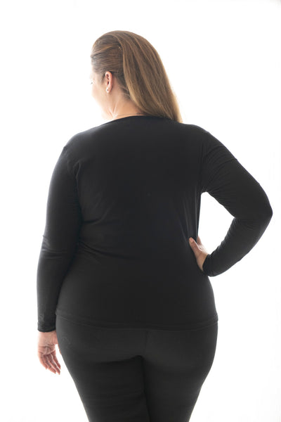 back view of lady in our black cami with long sleeves