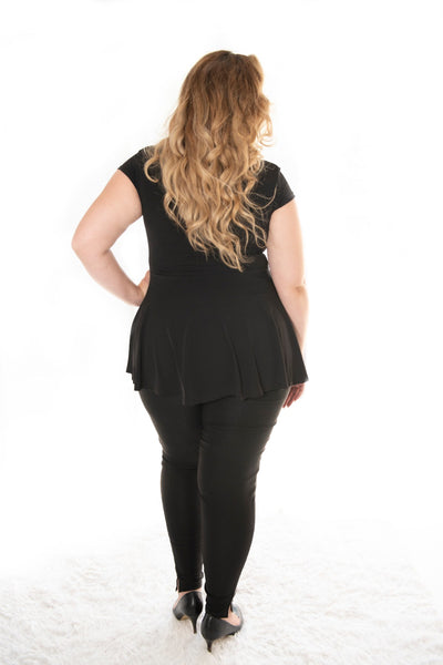 back view of lady wearing our black carriere with cap sleeve