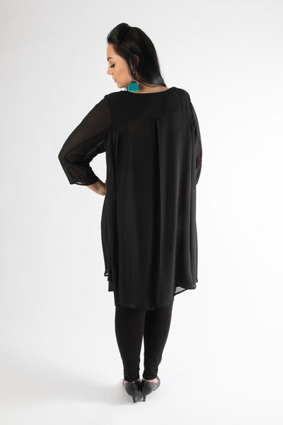 side view of model posing in our black emily jacket