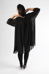 back view of model posing in our black emily jacket