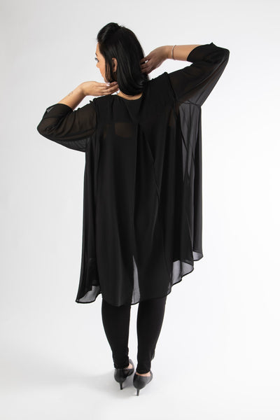 back view of model posing in our black emily jacket