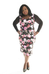 curvy model wearing our floral print bodycon dress 