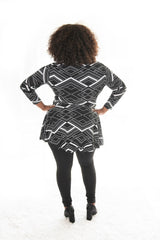 back view of lady in our geo print carriere top