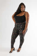 side view of multifloral branch printed cigar pants