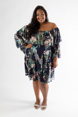 Voluptuous lady outfitted in our cute sophia midi dress