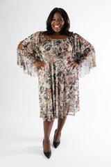 model posing in printed midi dress