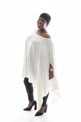 side view of a model in our white angelica poncho