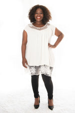 plus-size model wearing our winter white annabelle top